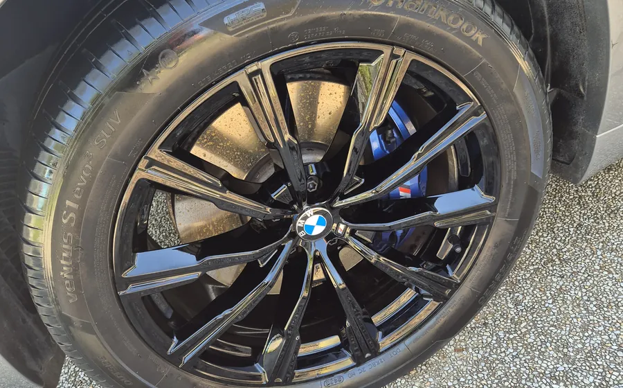 Cleaned and dressed alloy wheel after detailing