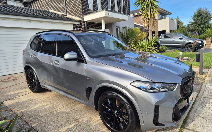 Grey BMW X5 detailed in the driveway, Berwick
