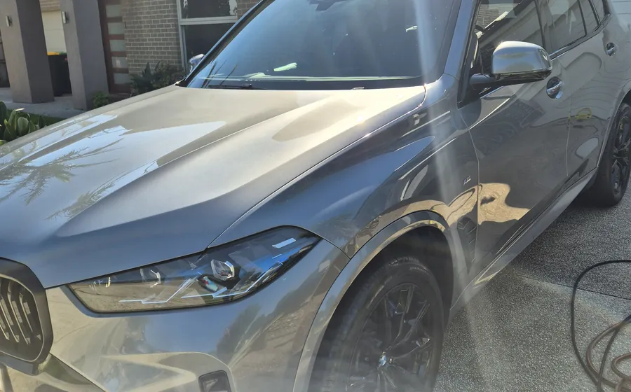 Deep gloss on a dark car after detailing